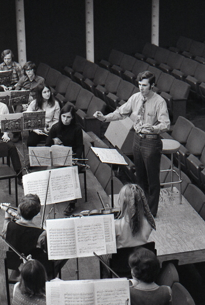 Michael Paul Gibson conducting rehearsal of Milwaukee Youth Symphony